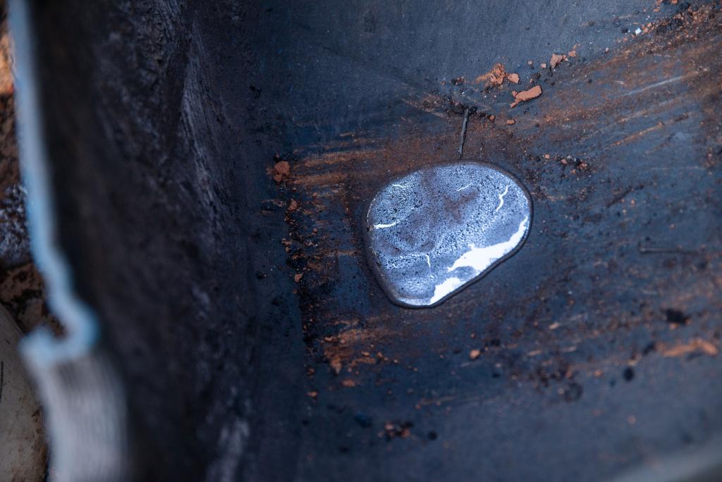 Pure mercury refined from cinnabar mineral ore. Artisanal miners are frequently exposed to toxic substances, fumes and dust from the refinement process.
